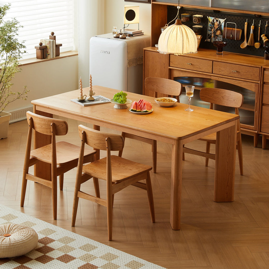 Scandinavian-style dining table with matching wooden chairs, perfect for modern homes, combining natural tones and minimalist design.