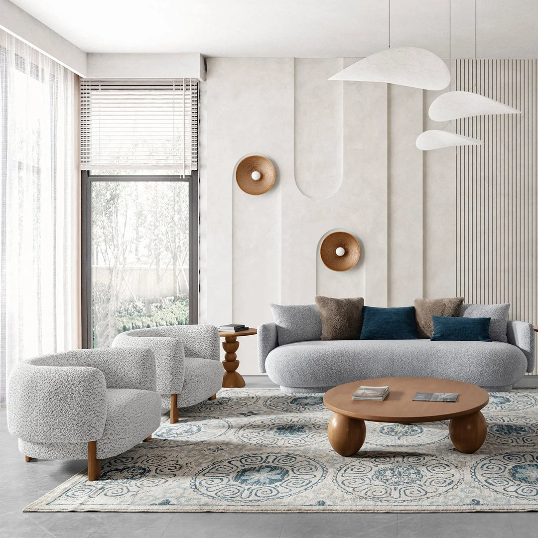 Loft Home weave fabric sofa set featuring cozy seating, textured armchairs, and a stylish wooden coffee table in a modern living room with natural light.