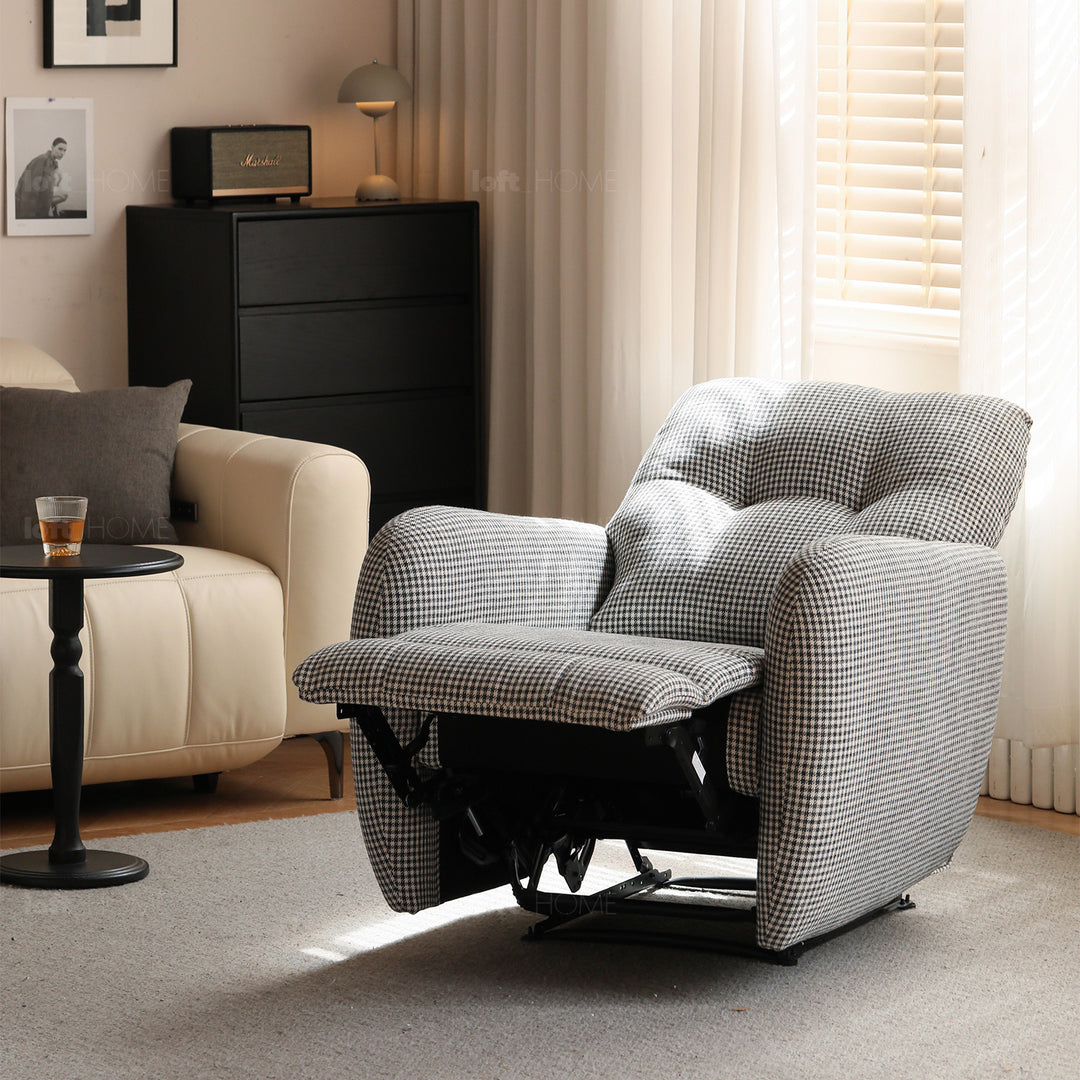 Cream cotton fabric recliner 1 seater sofa liberty in still life.