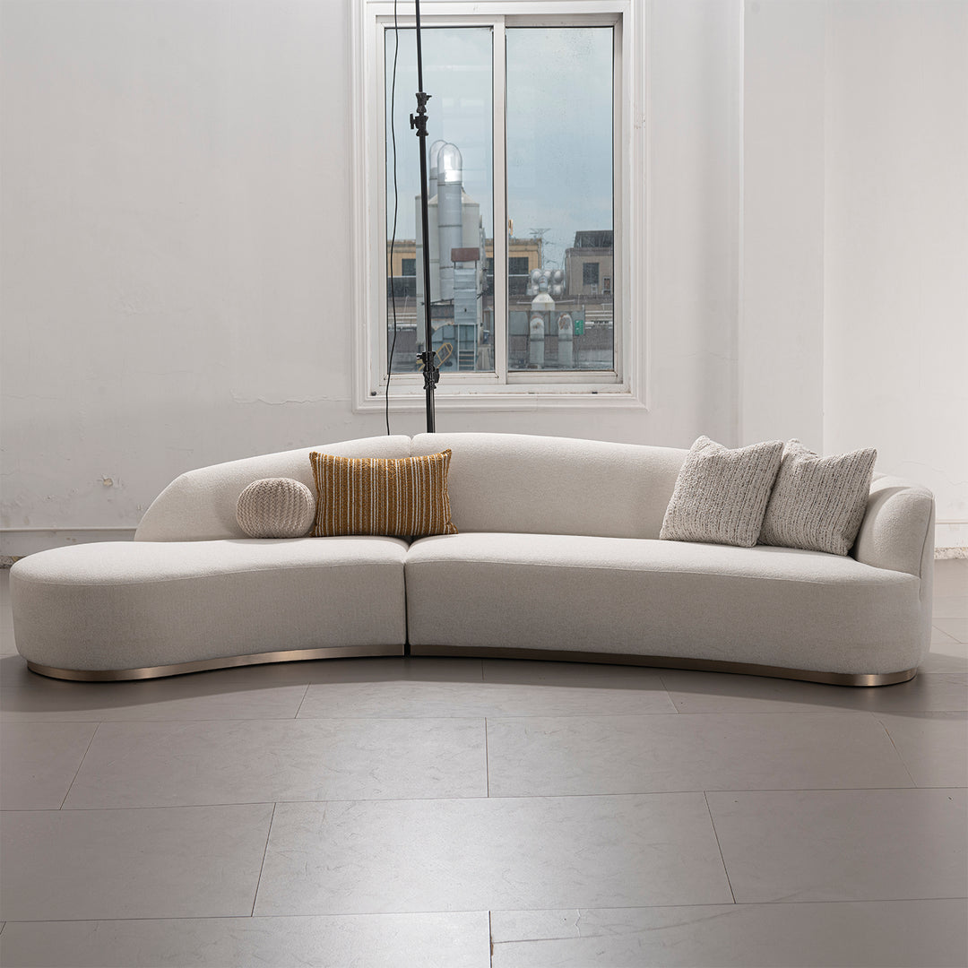 Modern boucle fabric modular l shape sectional sofa 3+l loomi in panoramic view.