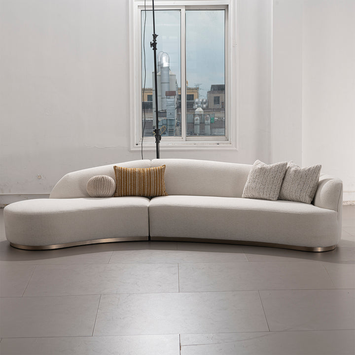 Modern boucle fabric modular l shape sectional sofa 3+l loomi in panoramic view.