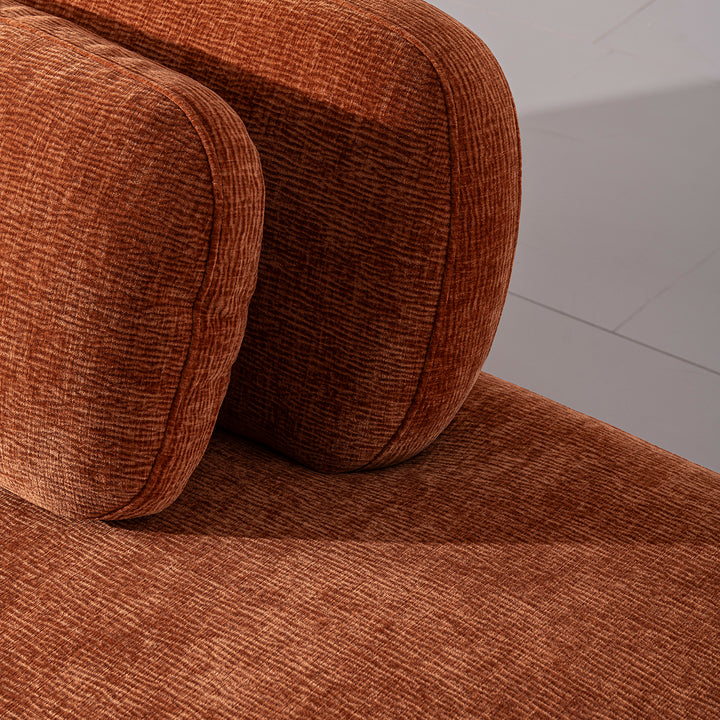 Cream velvet fabric modular chaise 2 seater sofa bubba in still life.