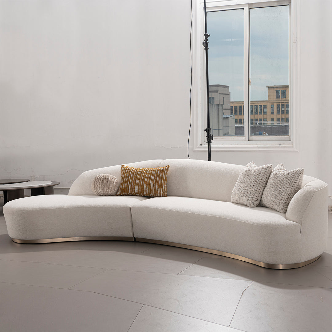 Modern boucle fabric modular l shape sectional sofa 3+l loomi in still life.