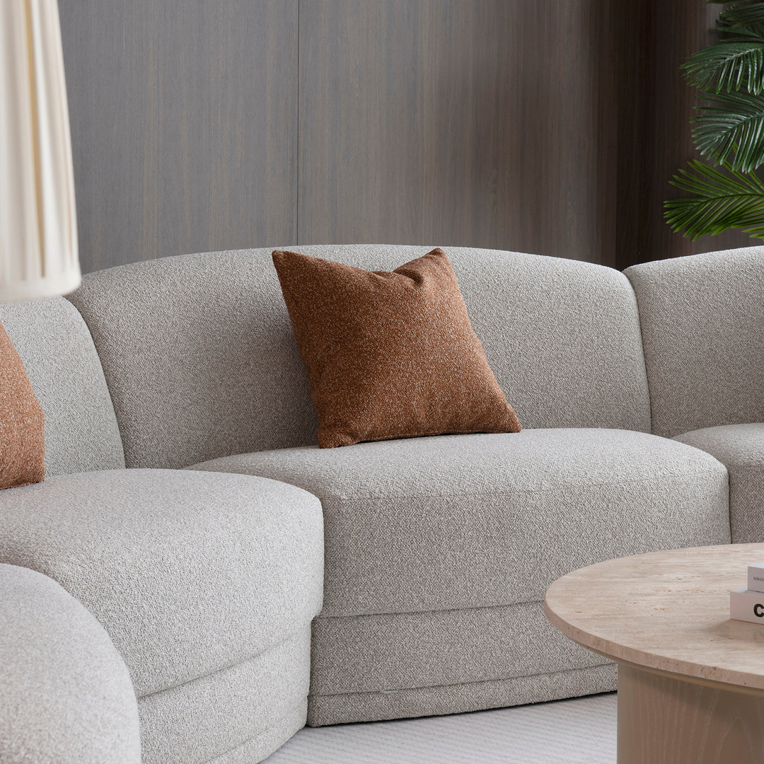Modern boucle fabric modular sectional 5 seater sofa curva in real life style.