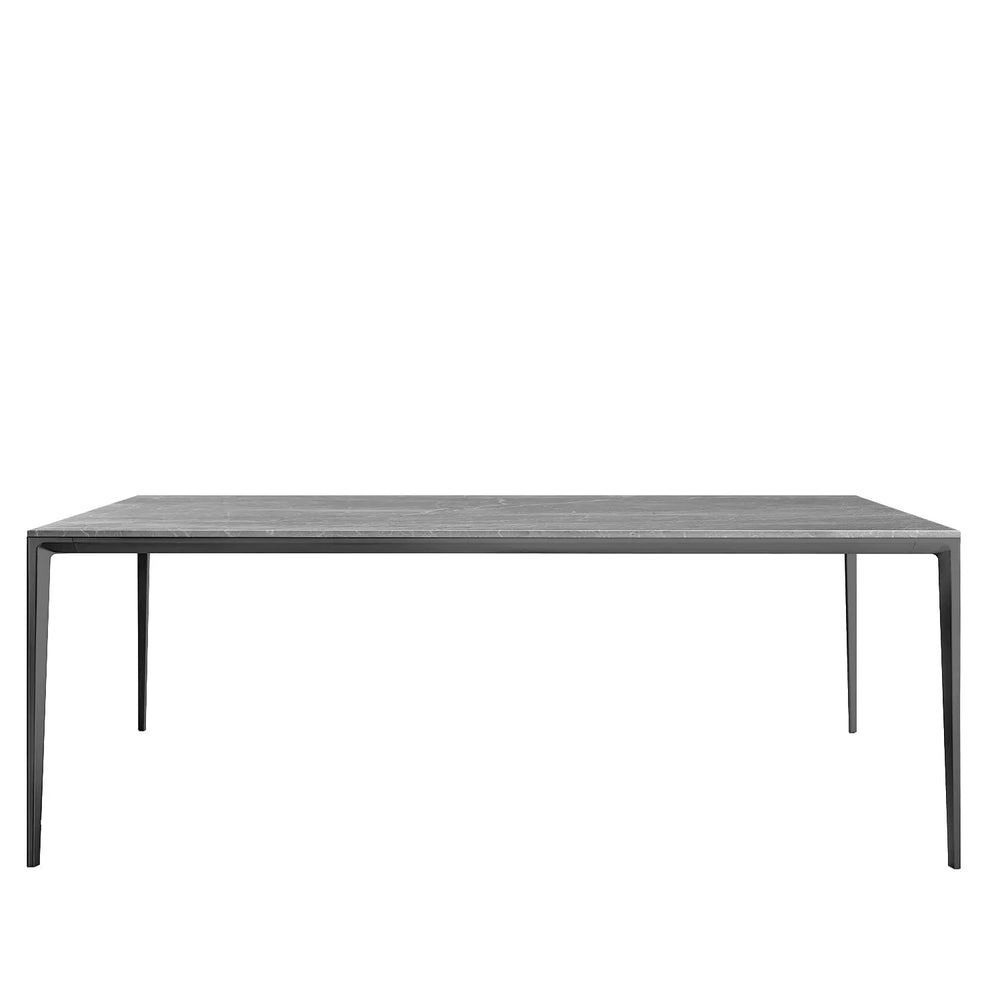 Minimalist sintered stone dining table long island grey in white background.