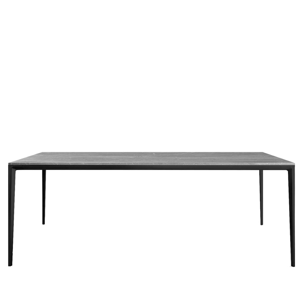 Minimalist sintered stone dining table long island black in white background.
