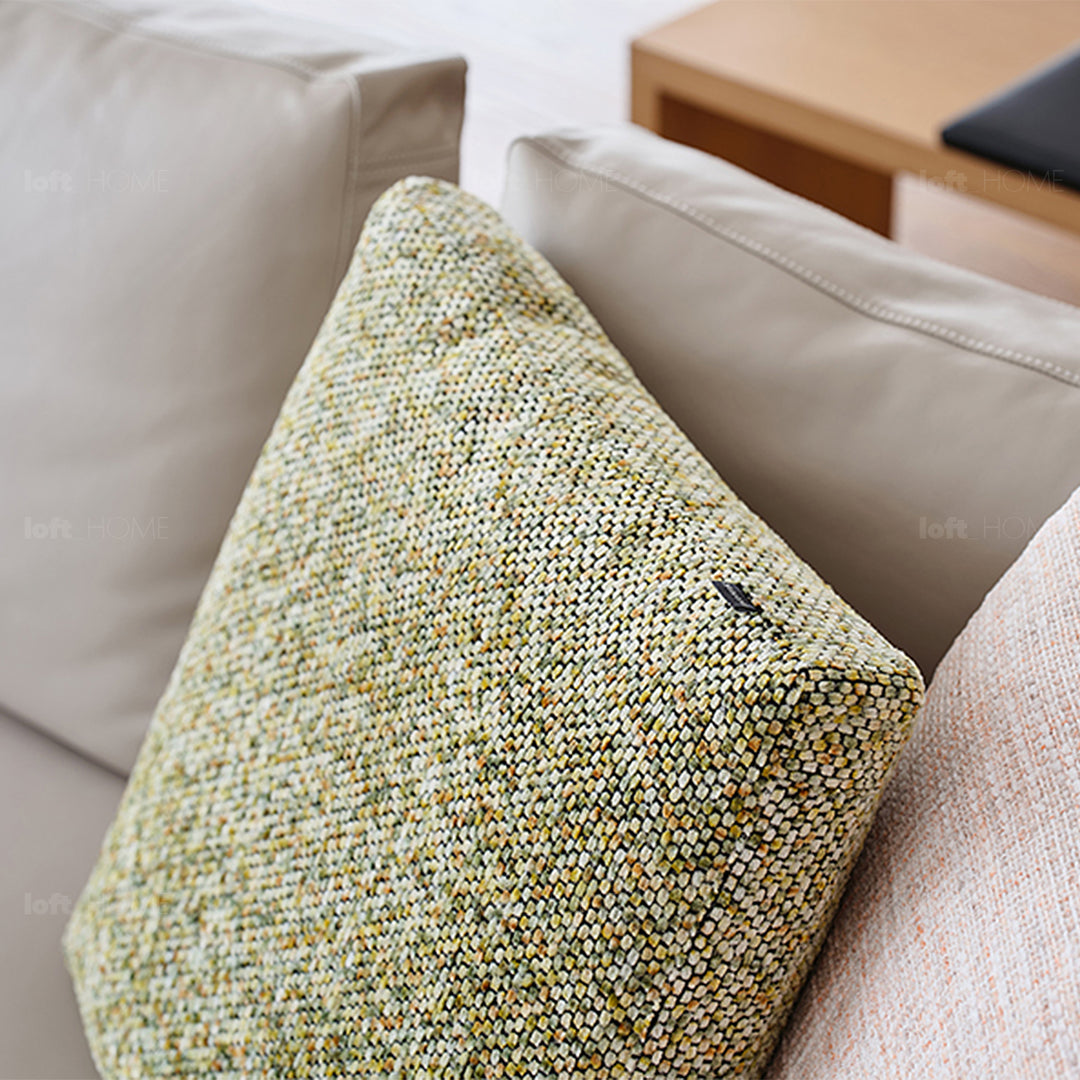 Minimalist fabric sofa pillow summer green in details.