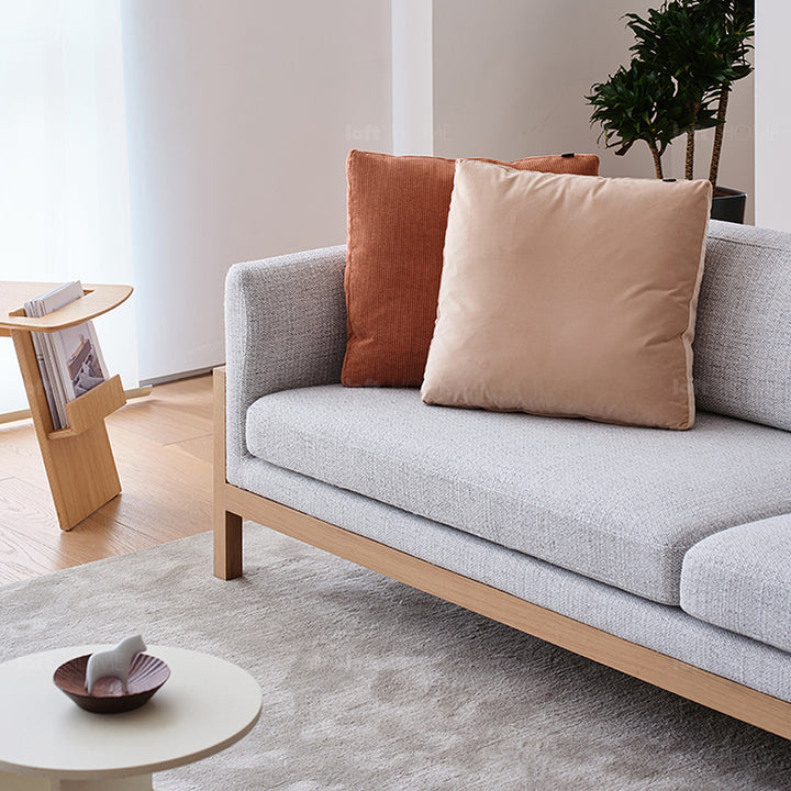 Minimalist fabric sofa pillow corduroy orange material variants.