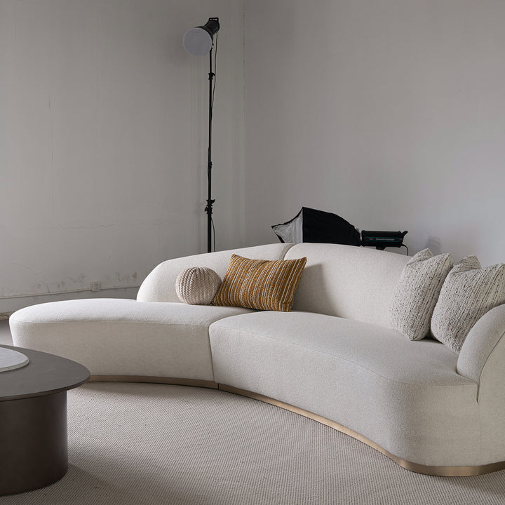 Modern boucle fabric modular l shape sectional sofa 3+l loomi in close up details.