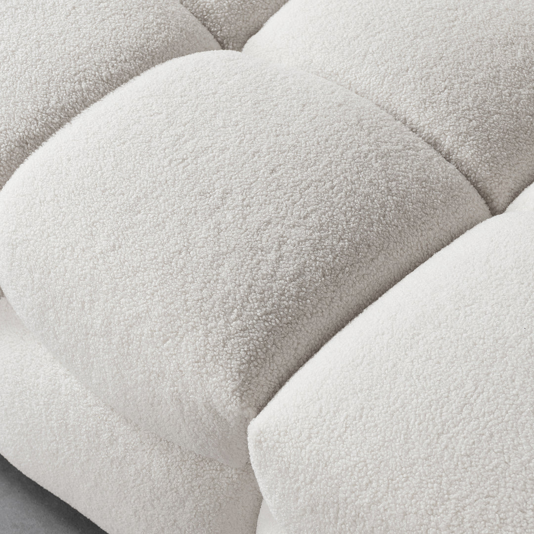Cream boucle fabric 2 seater sofa boba in close up details.
