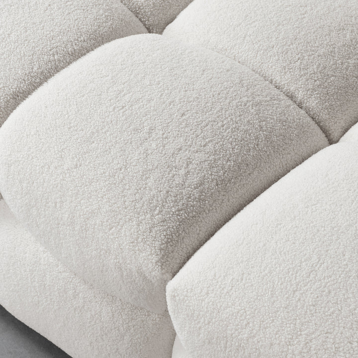 Cream boucle fabric 2 seater sofa boba in close up details.