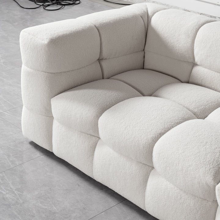 Cream boucle fabric 2 seater sofa boba in details.