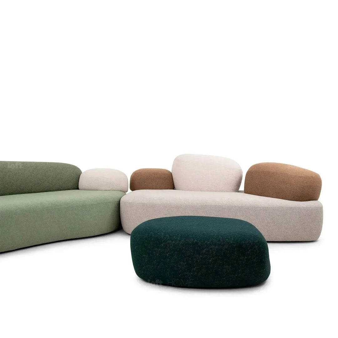 Contemporary fabric 4 seater sofa pebble with context.