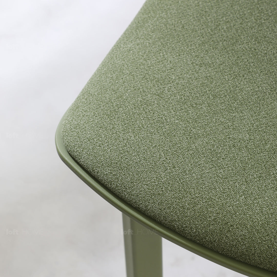 Contemporary fabric plastic dining chair hug in real life style.