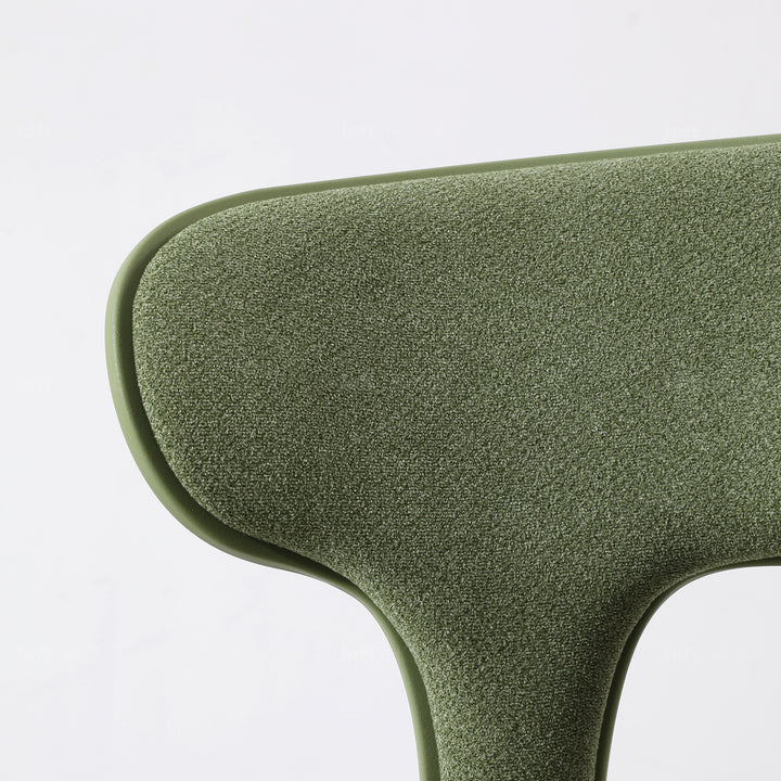 Contemporary fabric plastic dining chair hug with context.