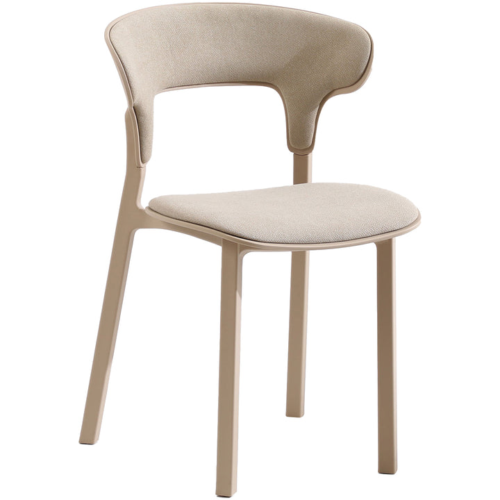 Contemporary fabric plastic dining chair hug in close up details.