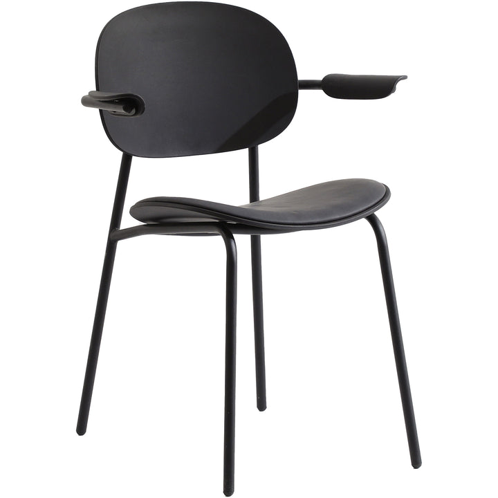 Contemporary fabric plastic dining chair loop in still life.