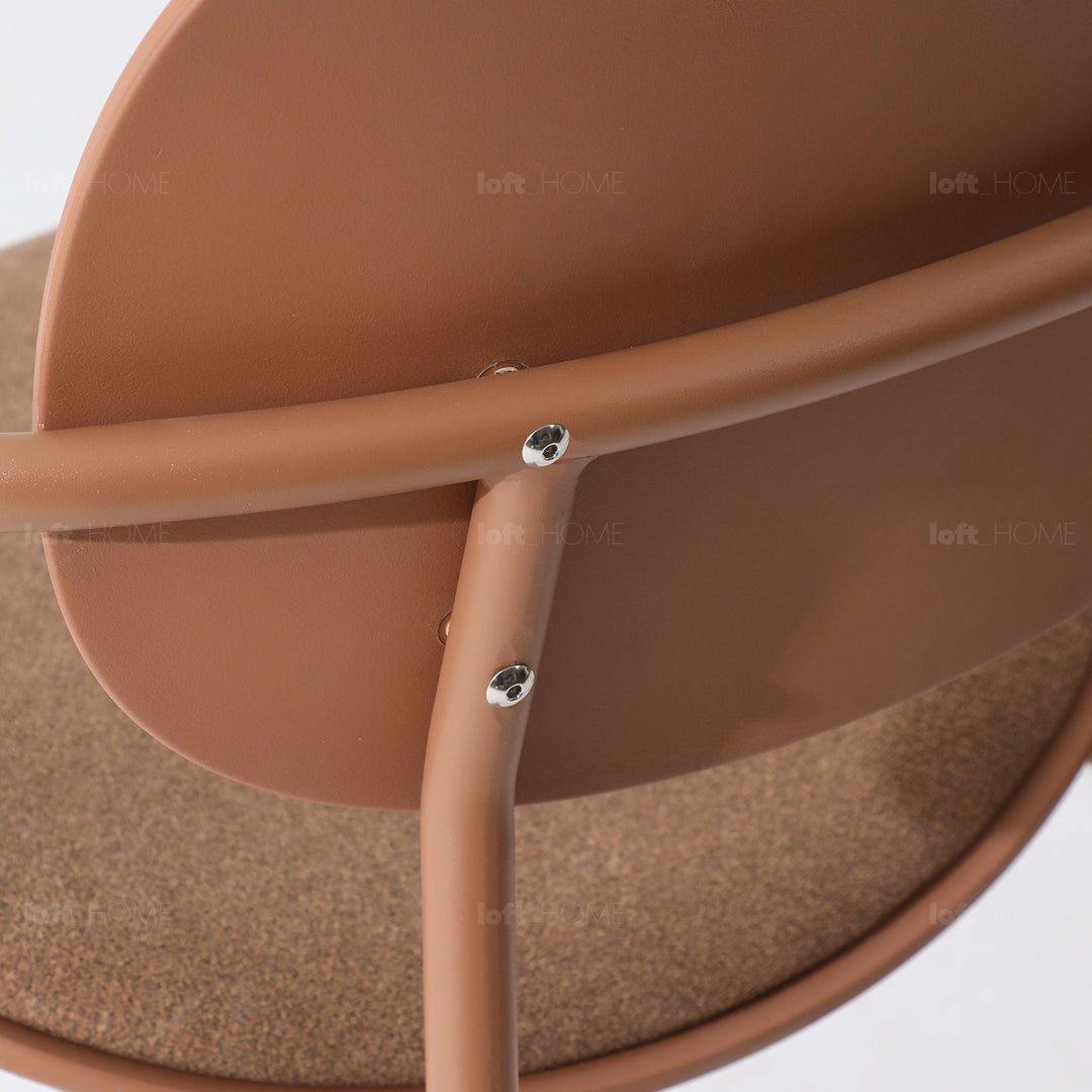 Contemporary fabric plastic dining chair loop with context.