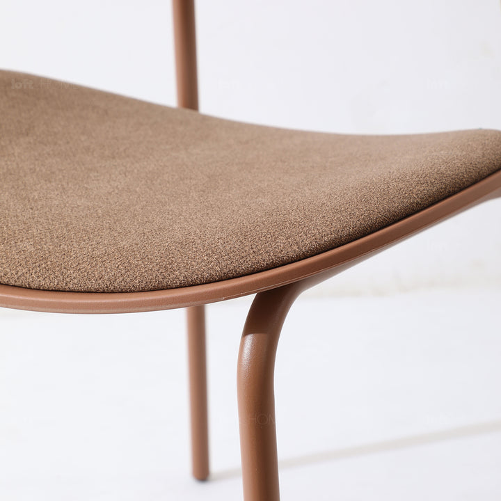 Contemporary fabric plastic dining chair loop in real life style.