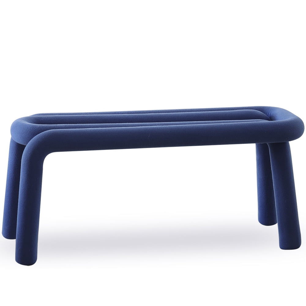 Contemporary velvet fabric dining bench bold in white background.