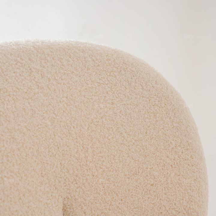 Cream boucle dining chair pavlova i in close up details.