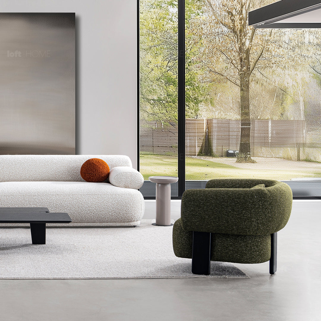 Cream boucle fabric 1 seater sofa nubo in real life style.