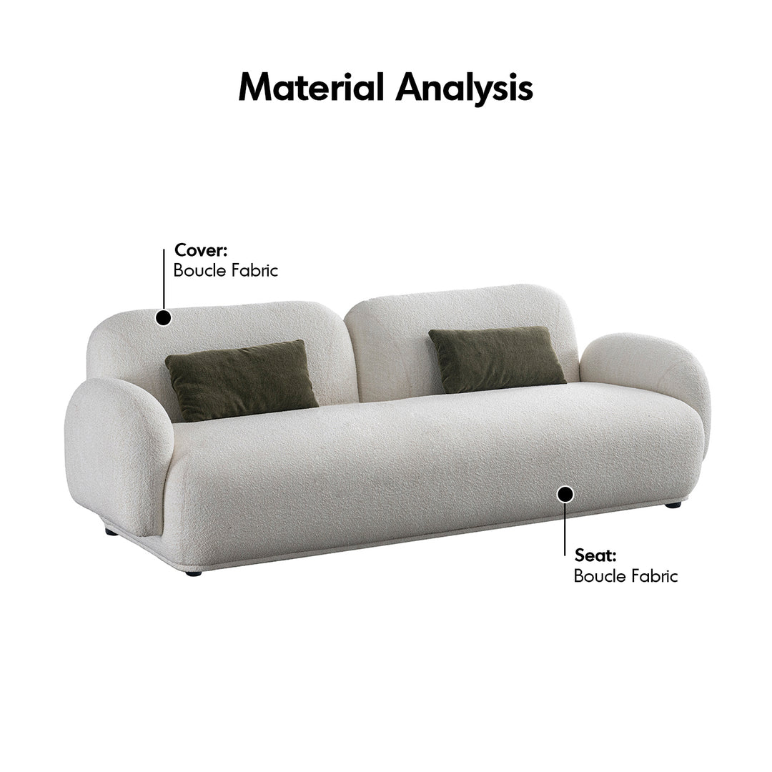 Cream boucle fabric 3 seater sofa pluum in details.