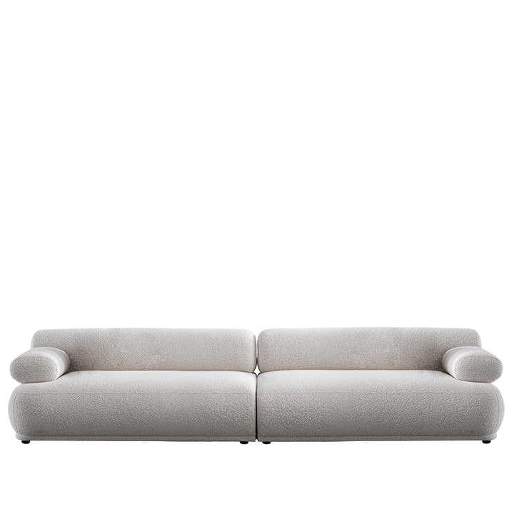 Cream boucle fabric 4 seater sofa mochi in white background.