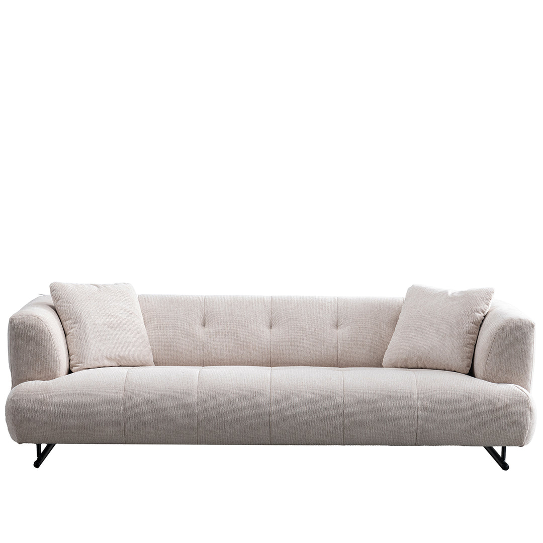 Cream cotton fabric 3 seater sofa verdo in white background.