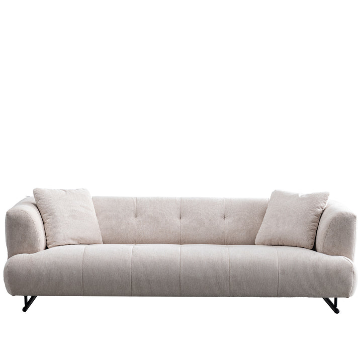 Cream cotton fabric 3 seater sofa verdo in white background.