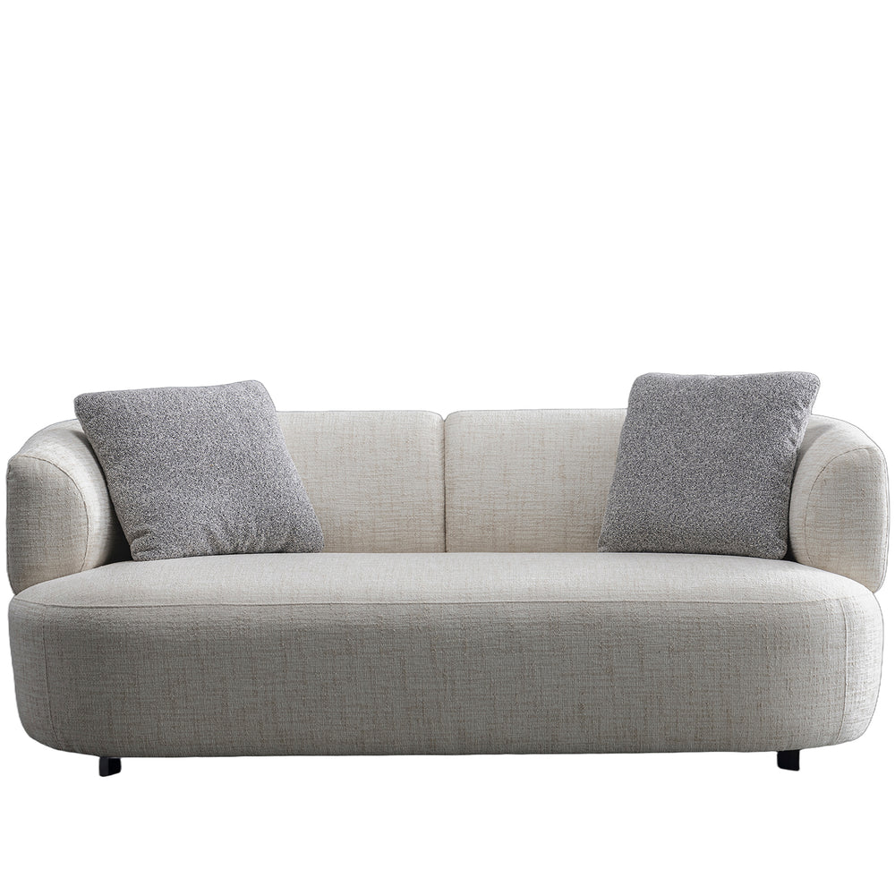 Cream mixed weave fabric 2 seater sofa noiry in white background.