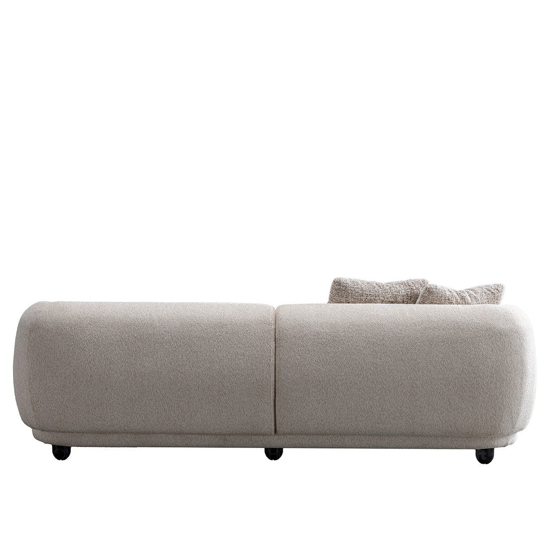 Cream mixed weave fabric 3 seater sofa puffy in details.