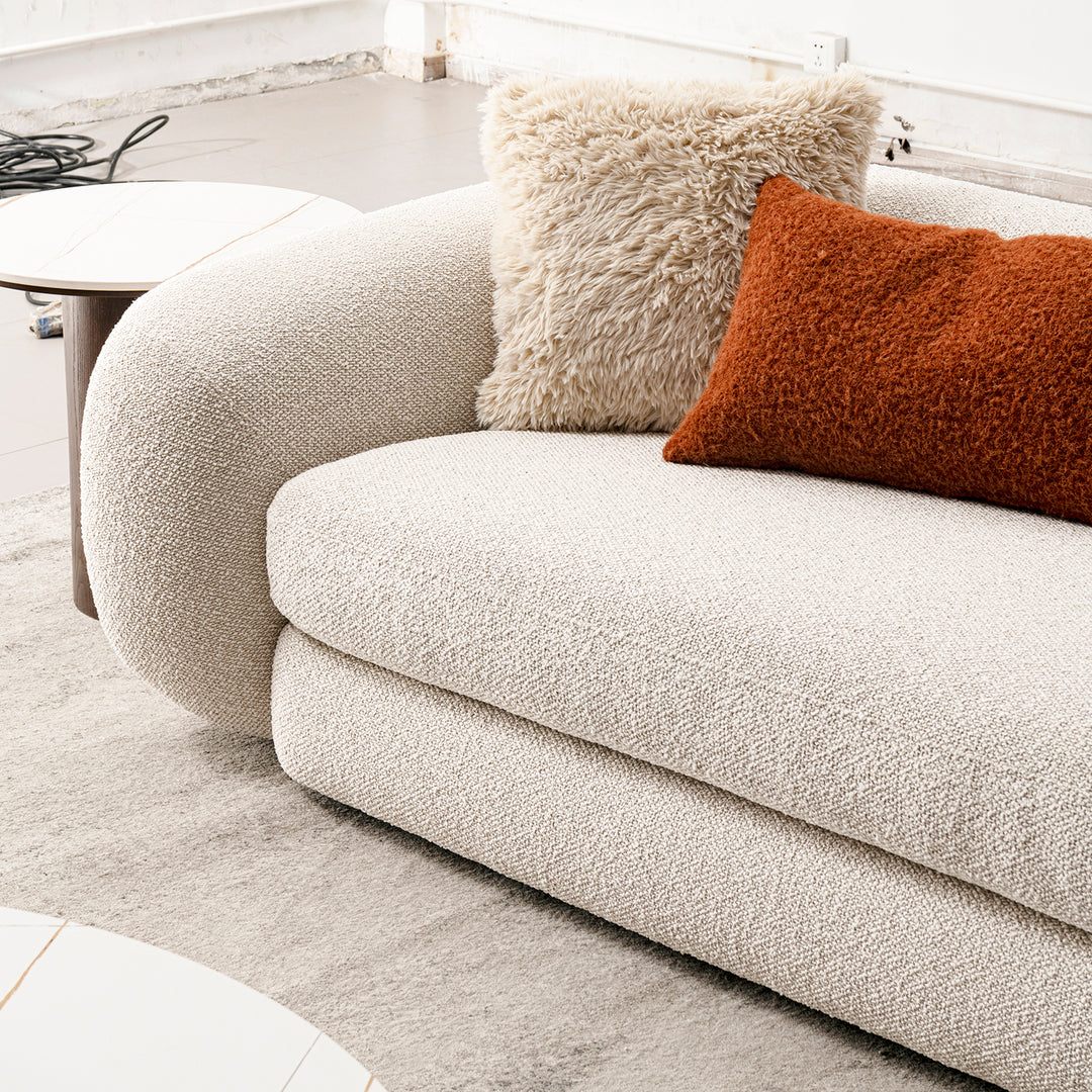 Cream boucle fabric 3 seater sofa curly in real life style.