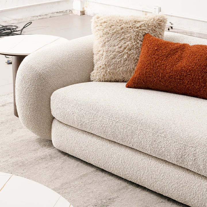 Cream boucle fabric 3 seater sofa curly in real life style.