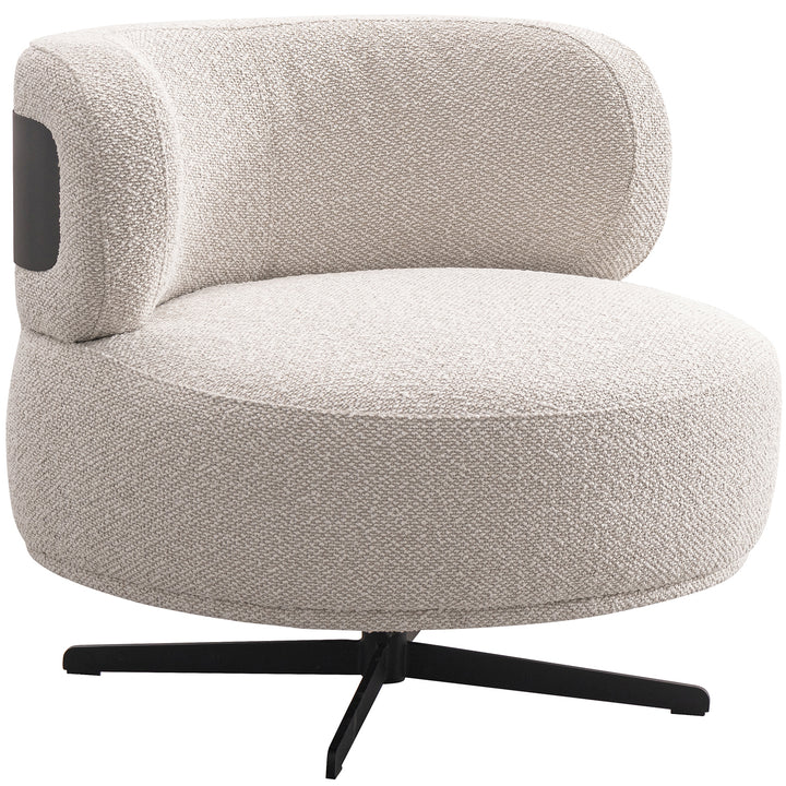 Cream boucle fabric revolving 1 seater sofa chair vuvo in white background.