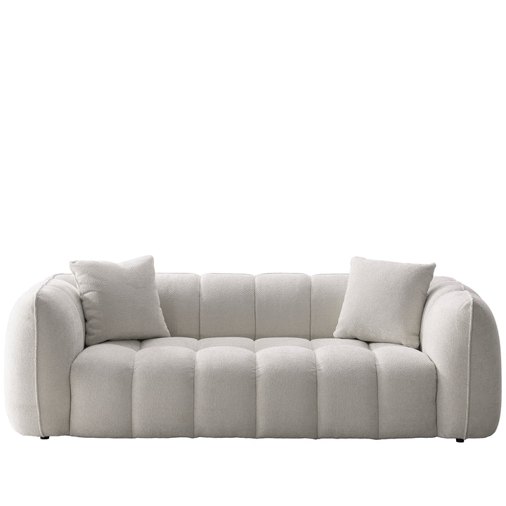 Cream mixed weave fabric 3 seater sofa puddy in white background.