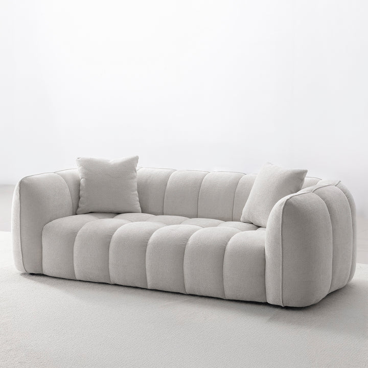 Cream mixed weave fabric 3 seater sofa puddy in real life style.