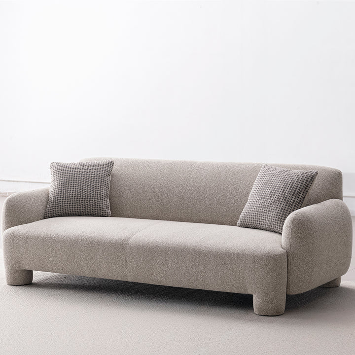 Cream mixed weave fabric 3 seater sofa syra in panoramic view.