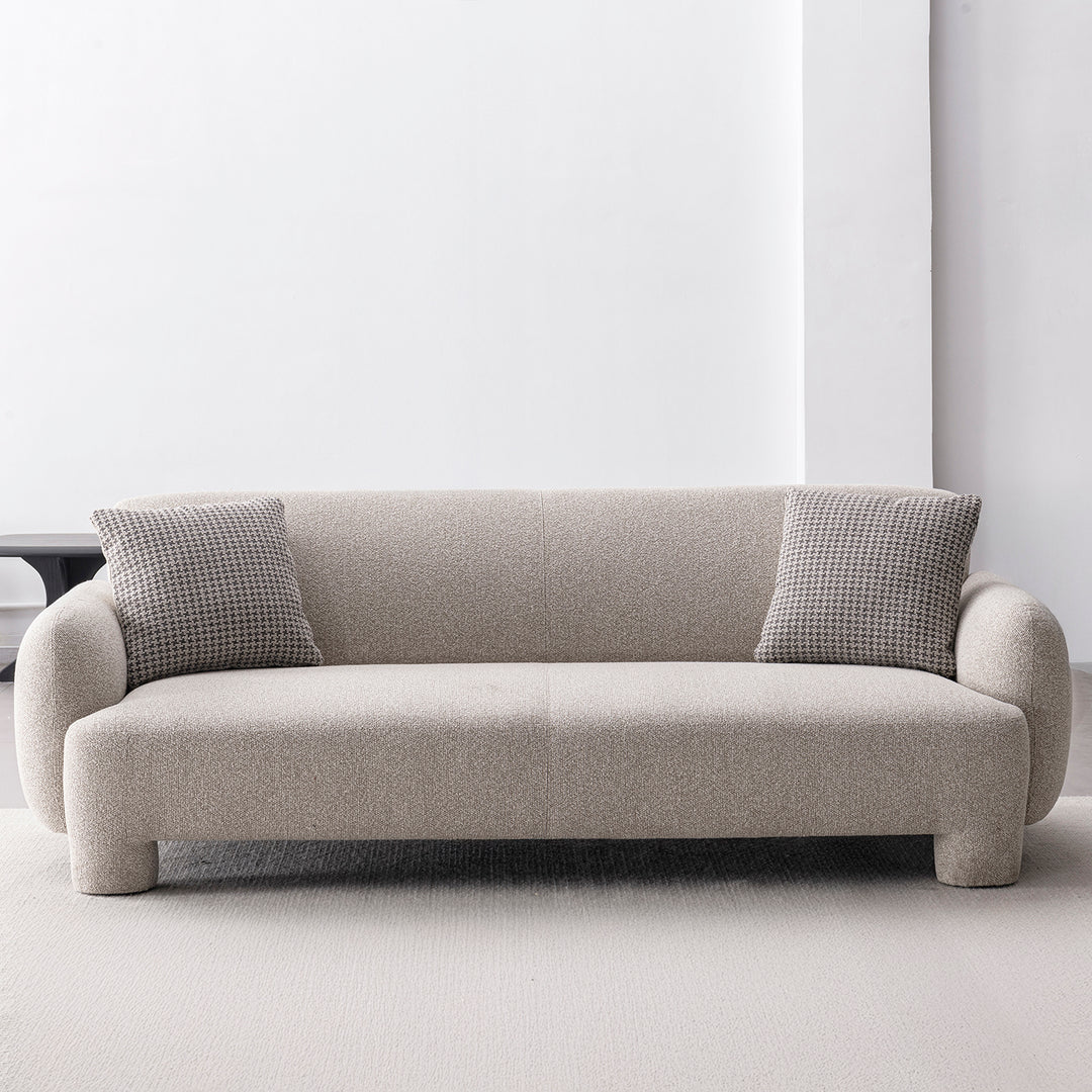 Cream mixed weave fabric 3 seater sofa syra in close up details.