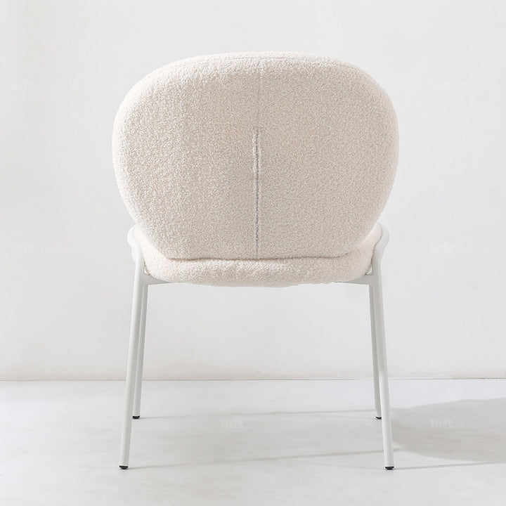 Cream boucle dining chair pavlova ii in real life style.