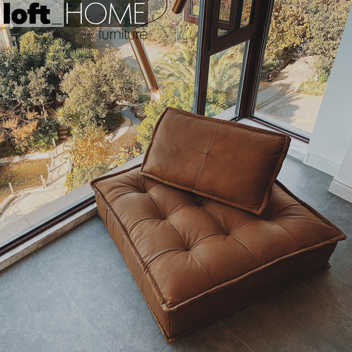 Vintage genuine leather 1 seater sofa element single in real life style.