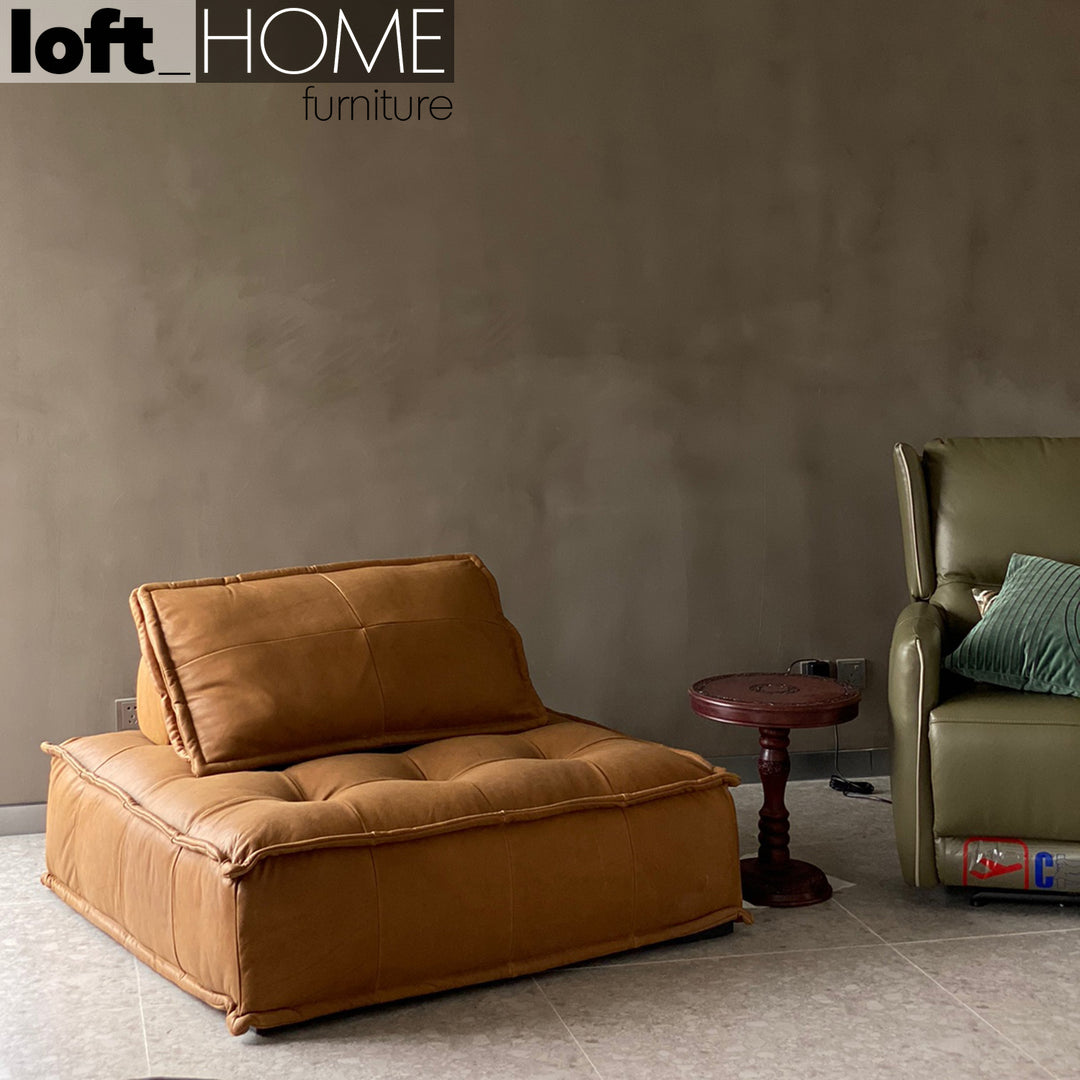 Vintage genuine leather 1 seater sofa element single with context.