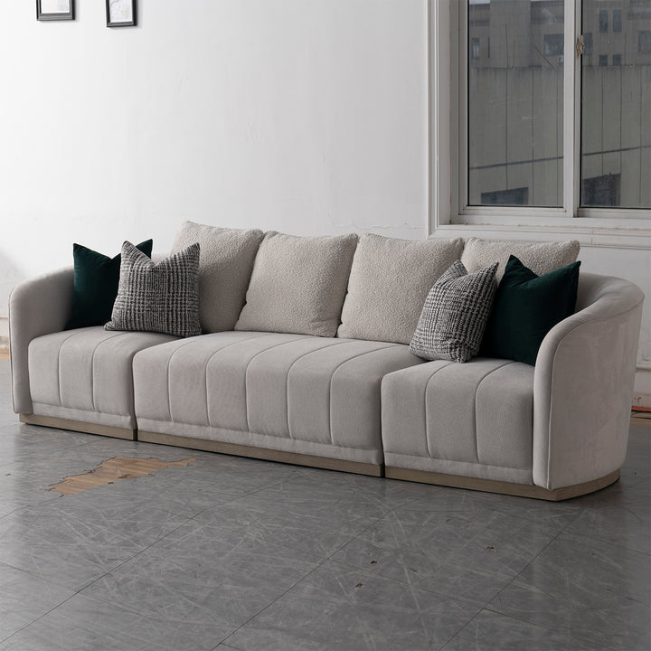 Japandi cotton fabric sectional 4 seater sofa panna in panoramic view.