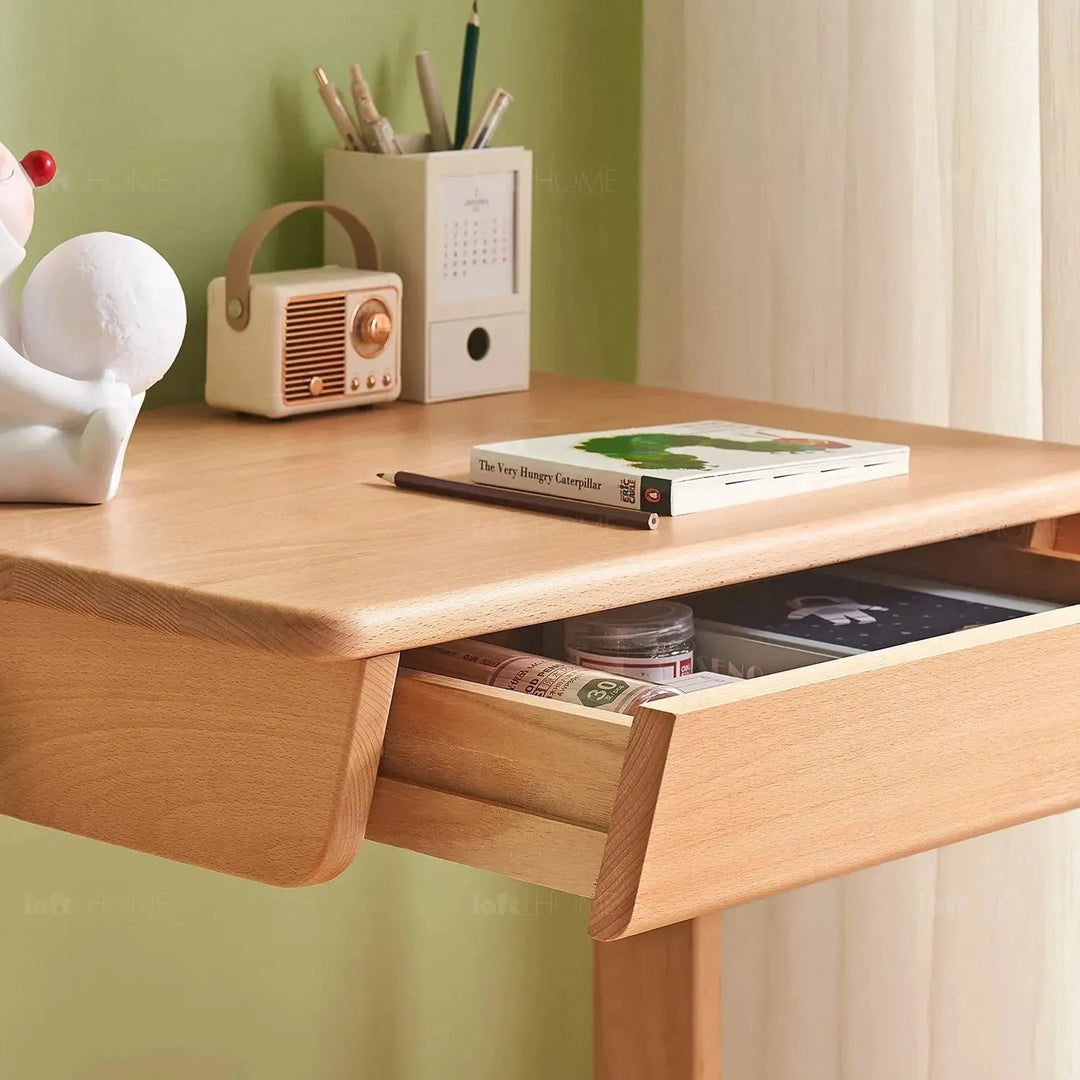 Scandinavian wood kids study table mini with context.