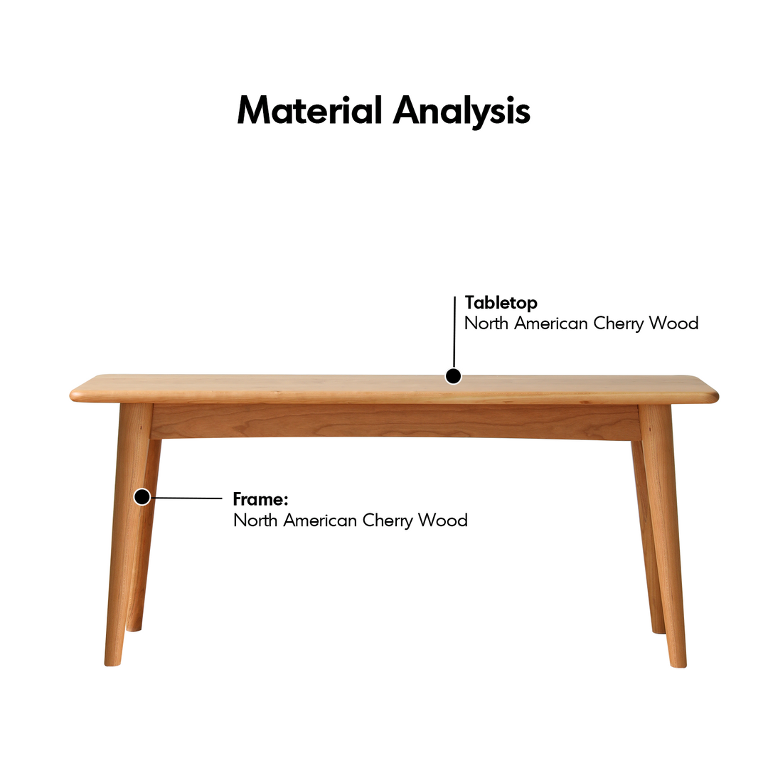 Scandinavian cherry wood dining bench green in still life.