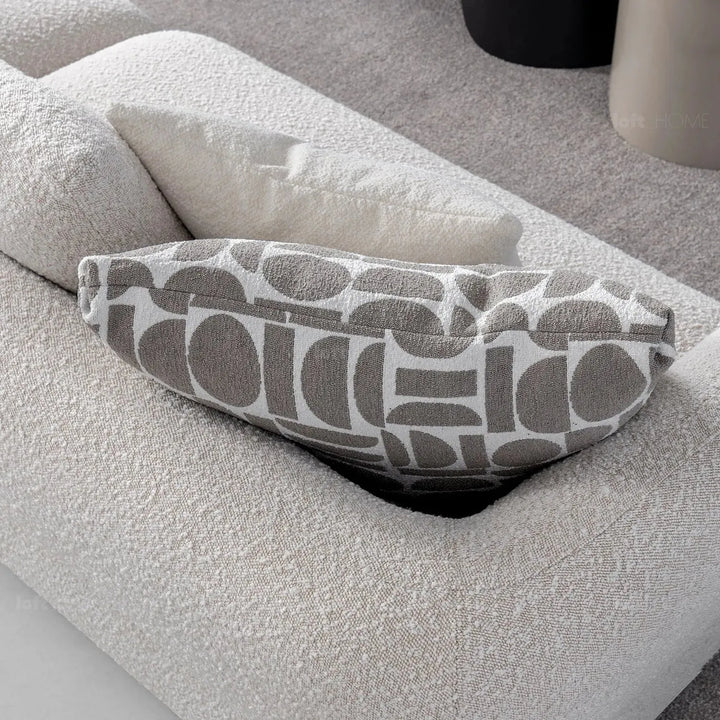 Modern boucle fabric 4 seater sofa couch in details.