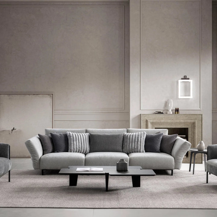 Modern boucle fabric bendable armrest 4 seater sofa pristine primary product view.