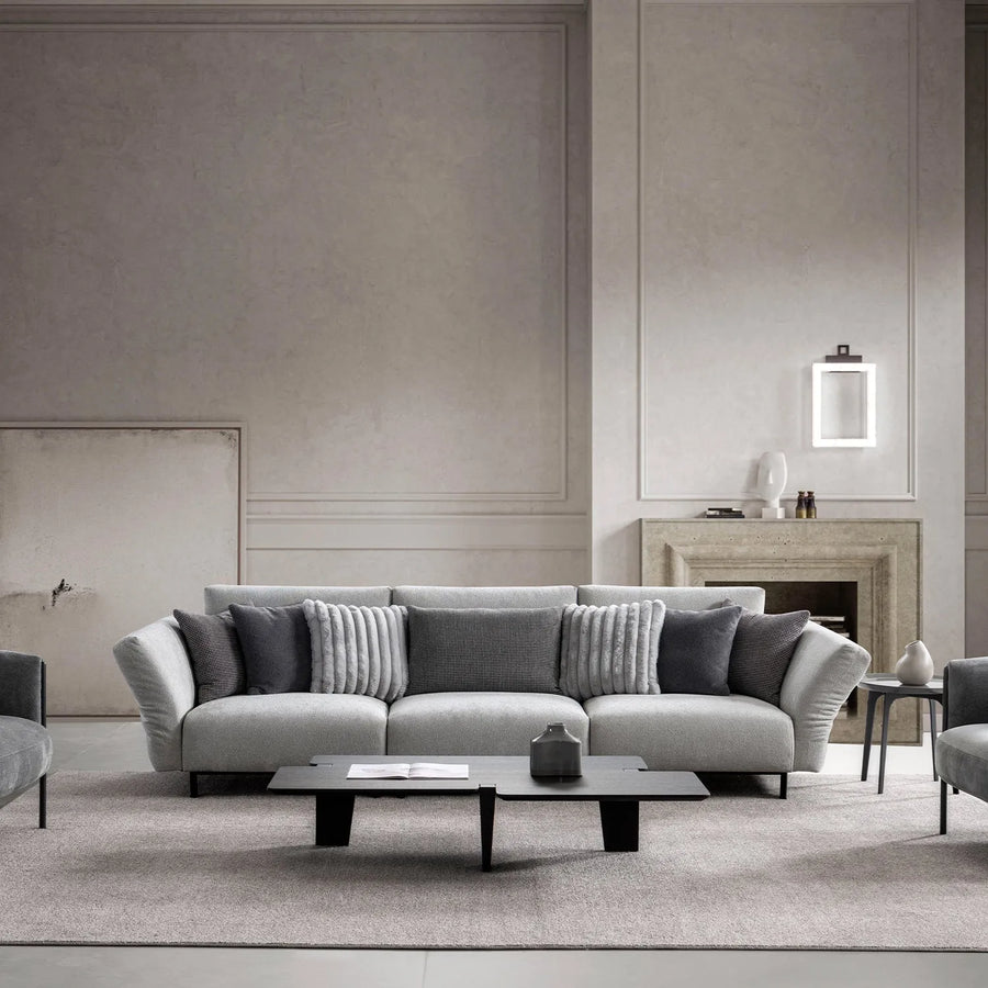 Modern boucle fabric bendable armrest 4 seater sofa pristine primary product view.