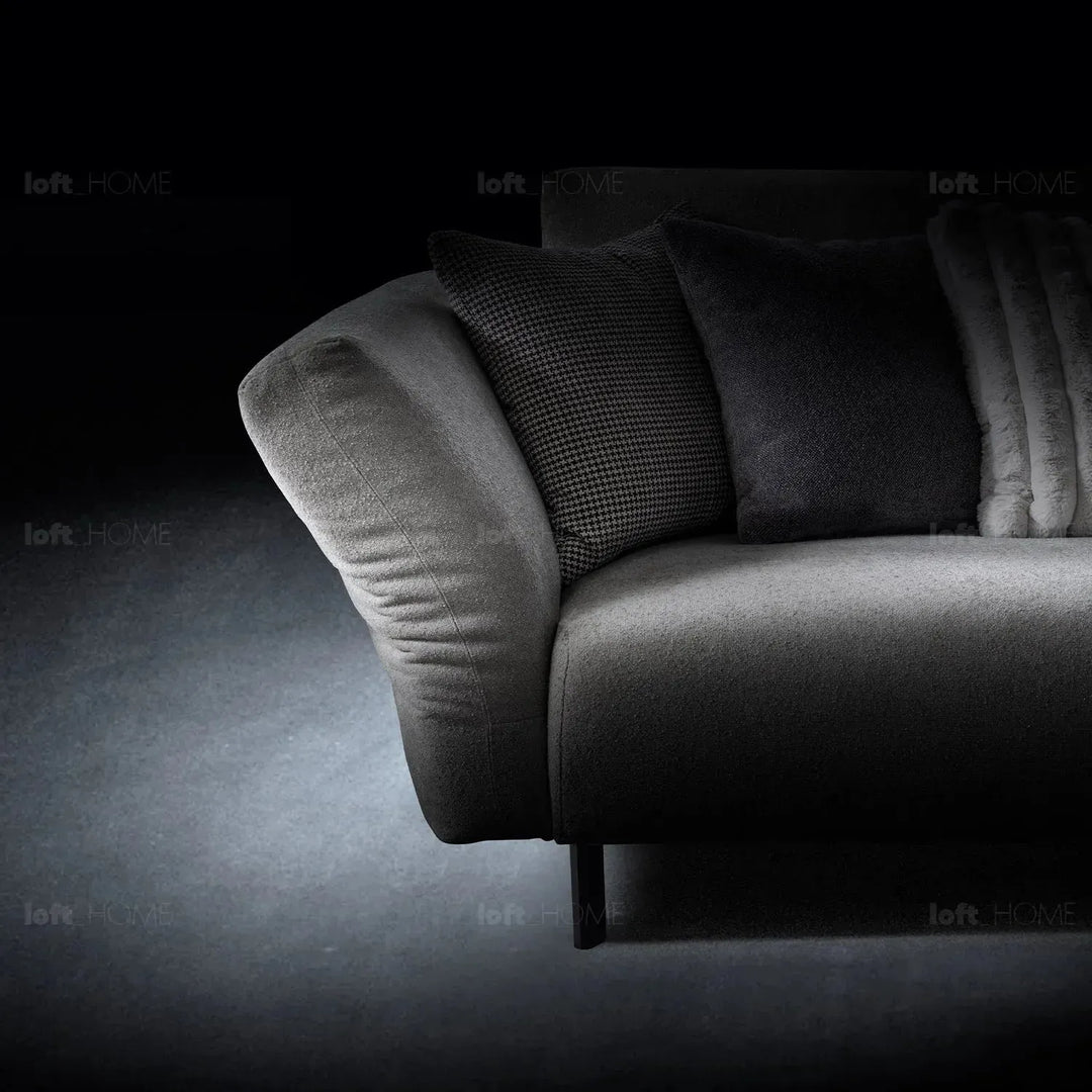 Modern boucle fabric bendable armrest 4 seater sofa pristine with context.