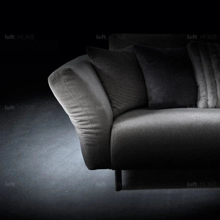 Modern boucle fabric bendable armrest 4 seater sofa pristine with context.